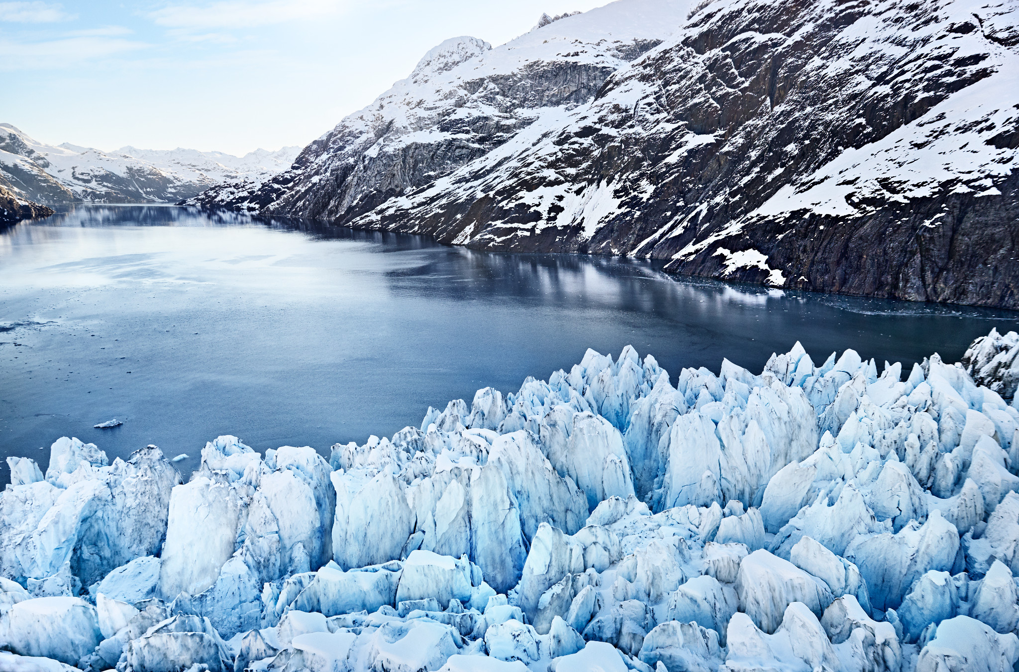 Snow capped mountains and ice formations in Alaska.