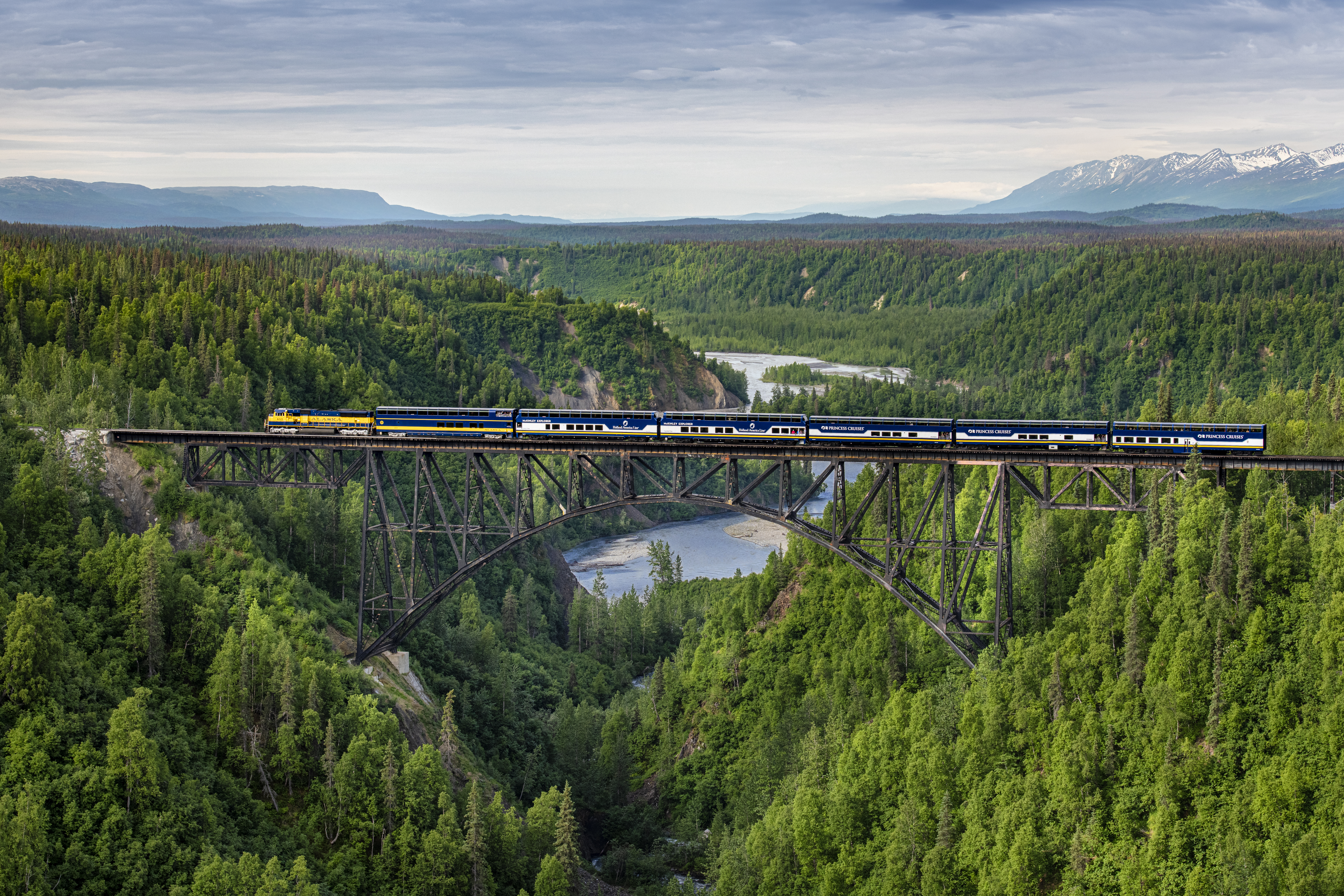 A train crossing Hurricane Gulch Bridge, 296 ft above Hurricane Creek in Alaska.